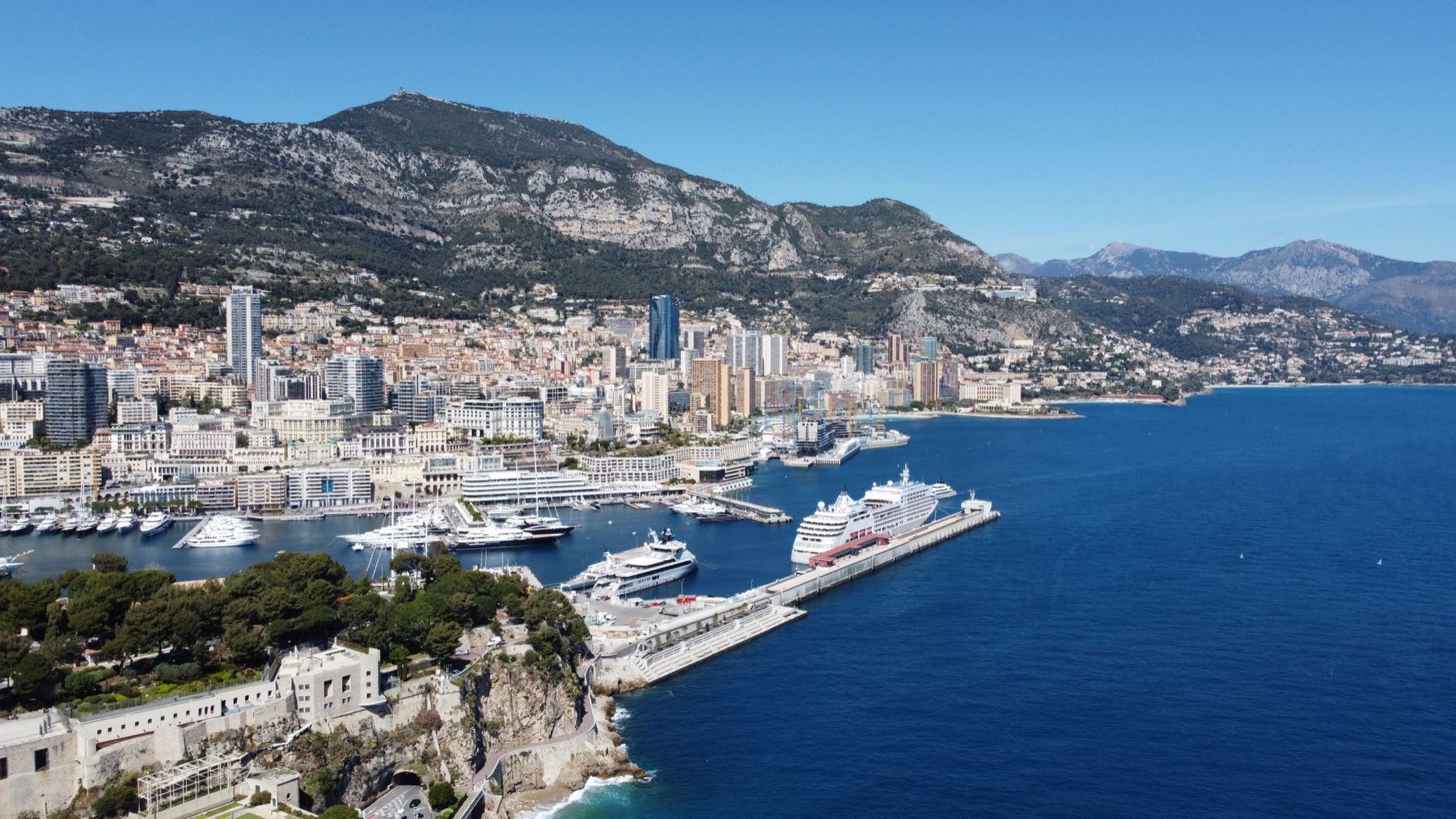 Monaco, its harbour and the Mediterranean coast in full daylight.